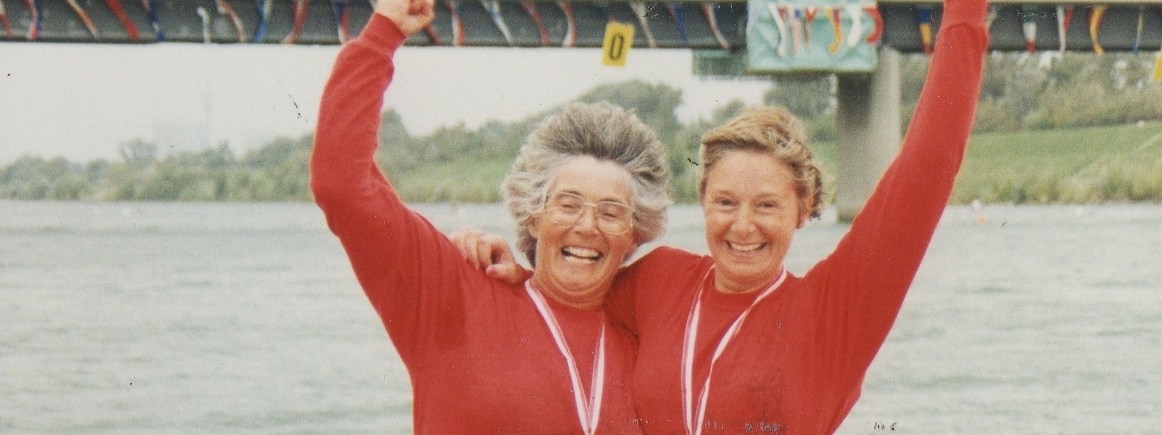Women in red tops celebrate