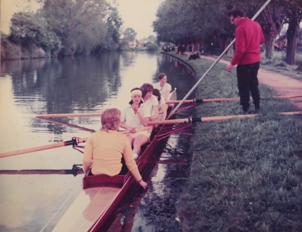 women's four being poled off