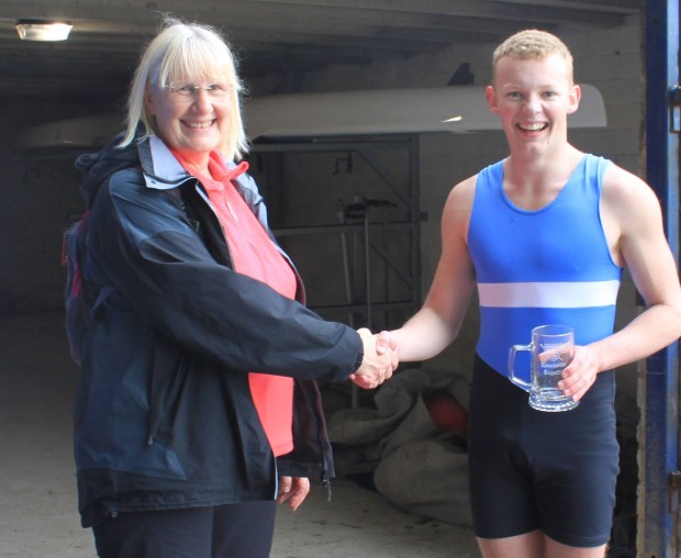 Pauline and a young sculler with tankard