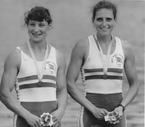 Women with medals at presentation ceremony