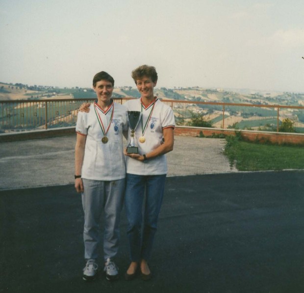 Two women with cup and medals