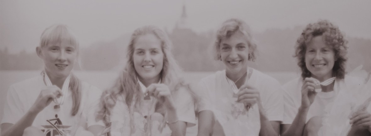 four women with medals