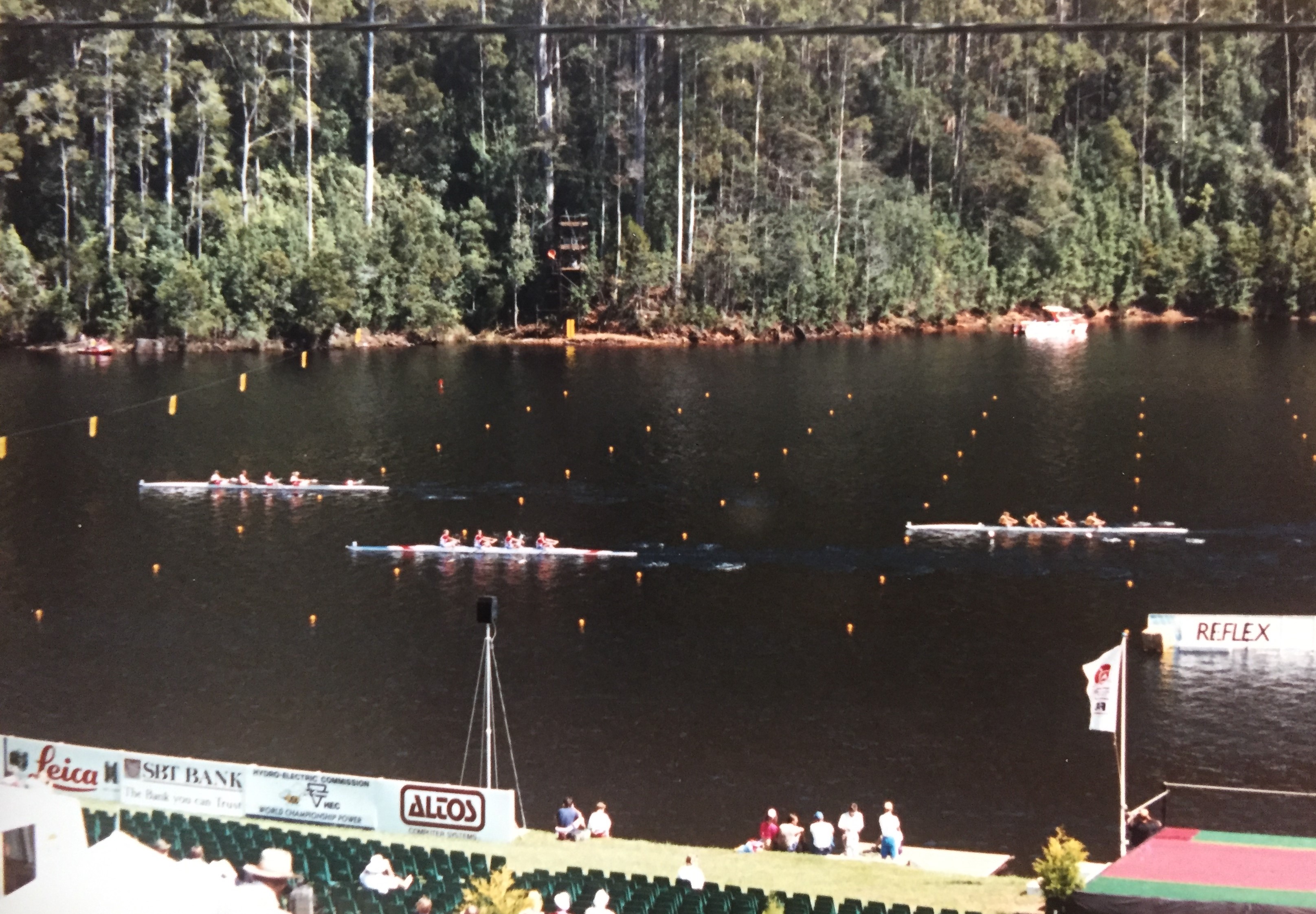 three women's fours at finish line