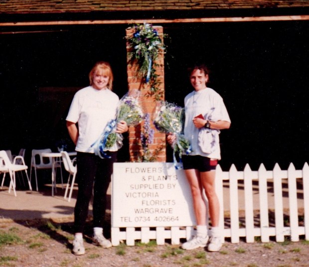 women with sign saying Victoria Florists, Wargrave