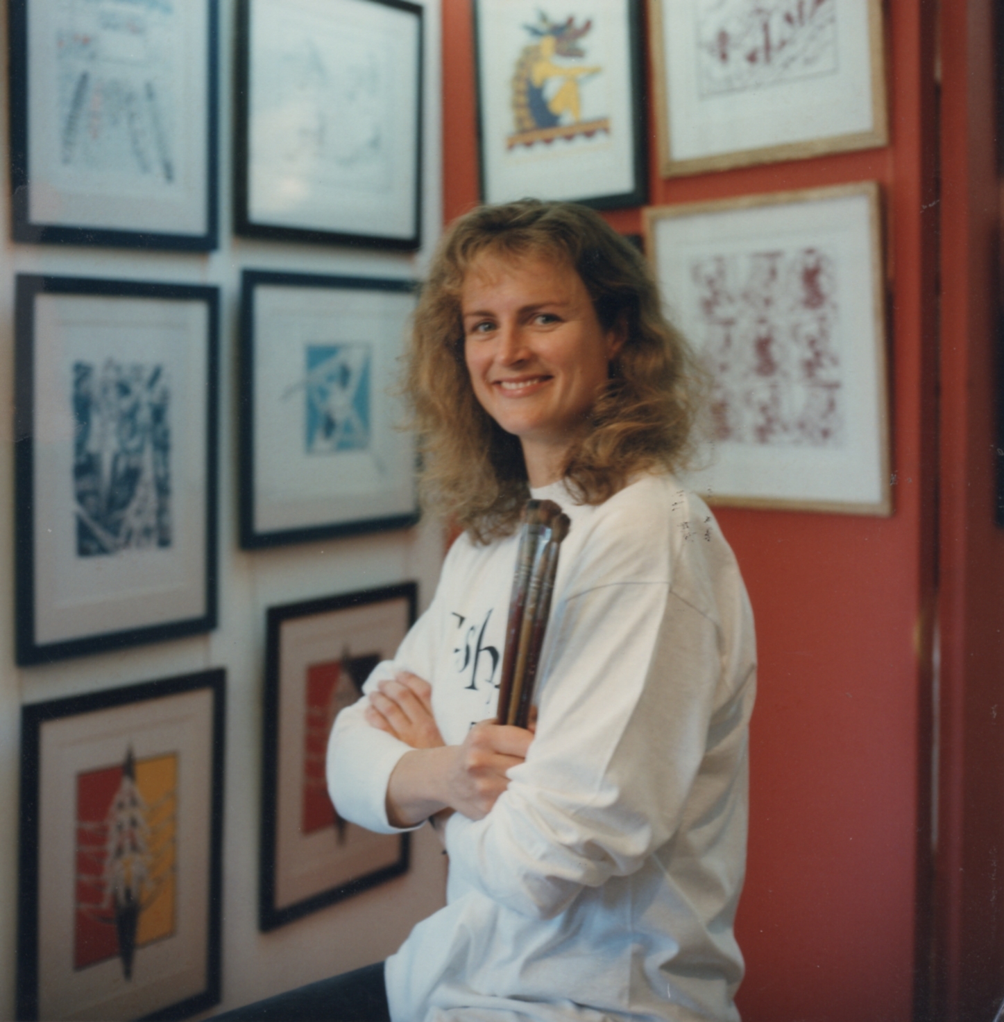 Annabel with framed pictures