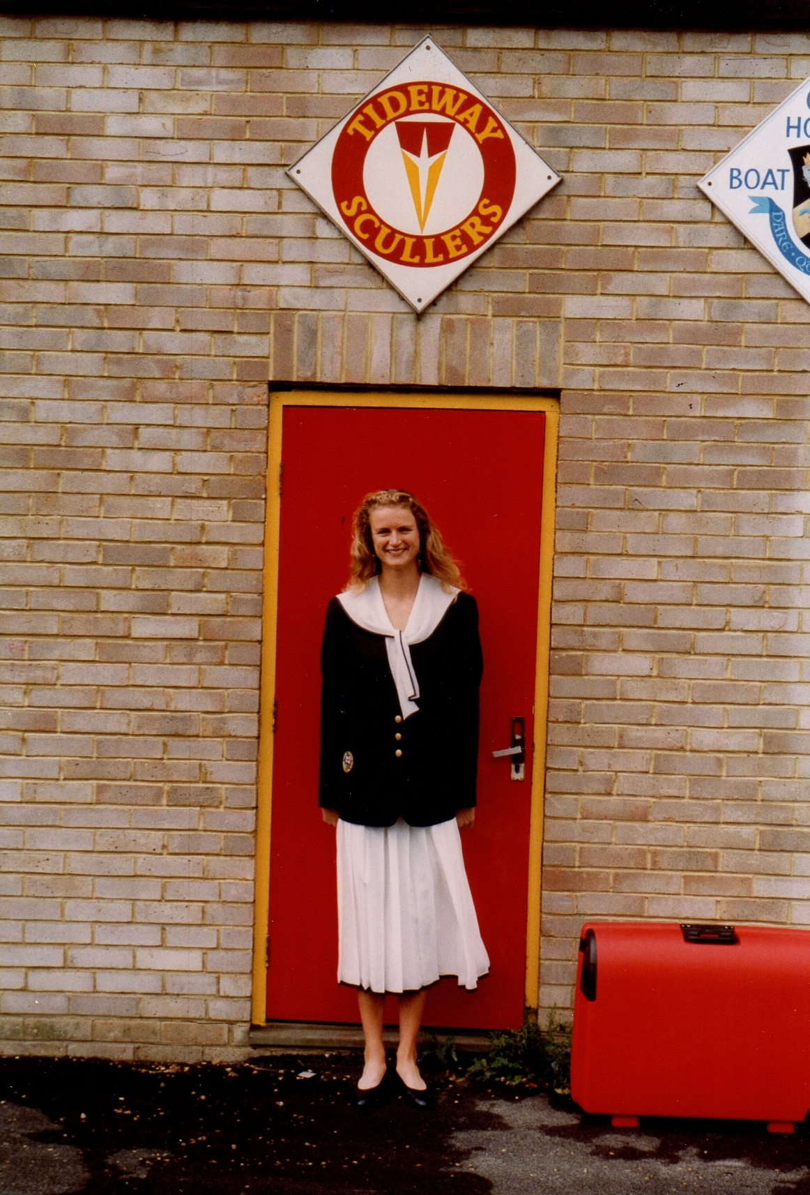 Annabel in white dress and navy blazer