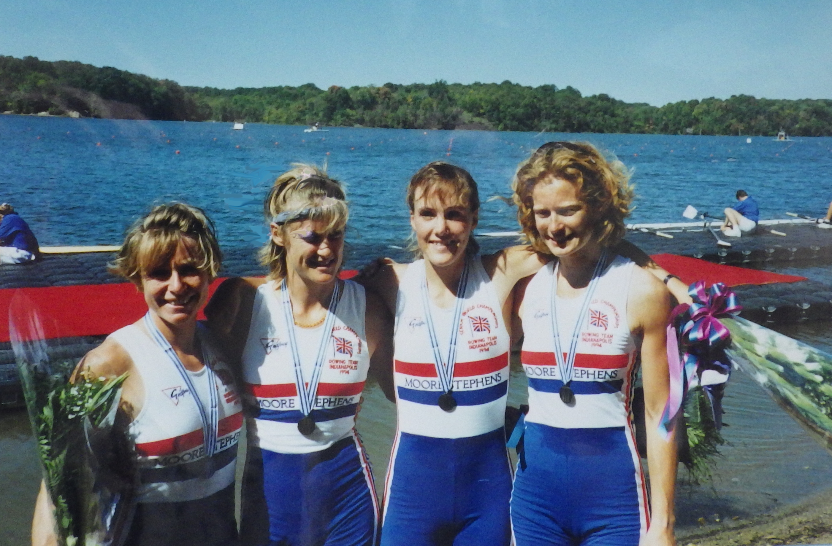 4 women with silver medals