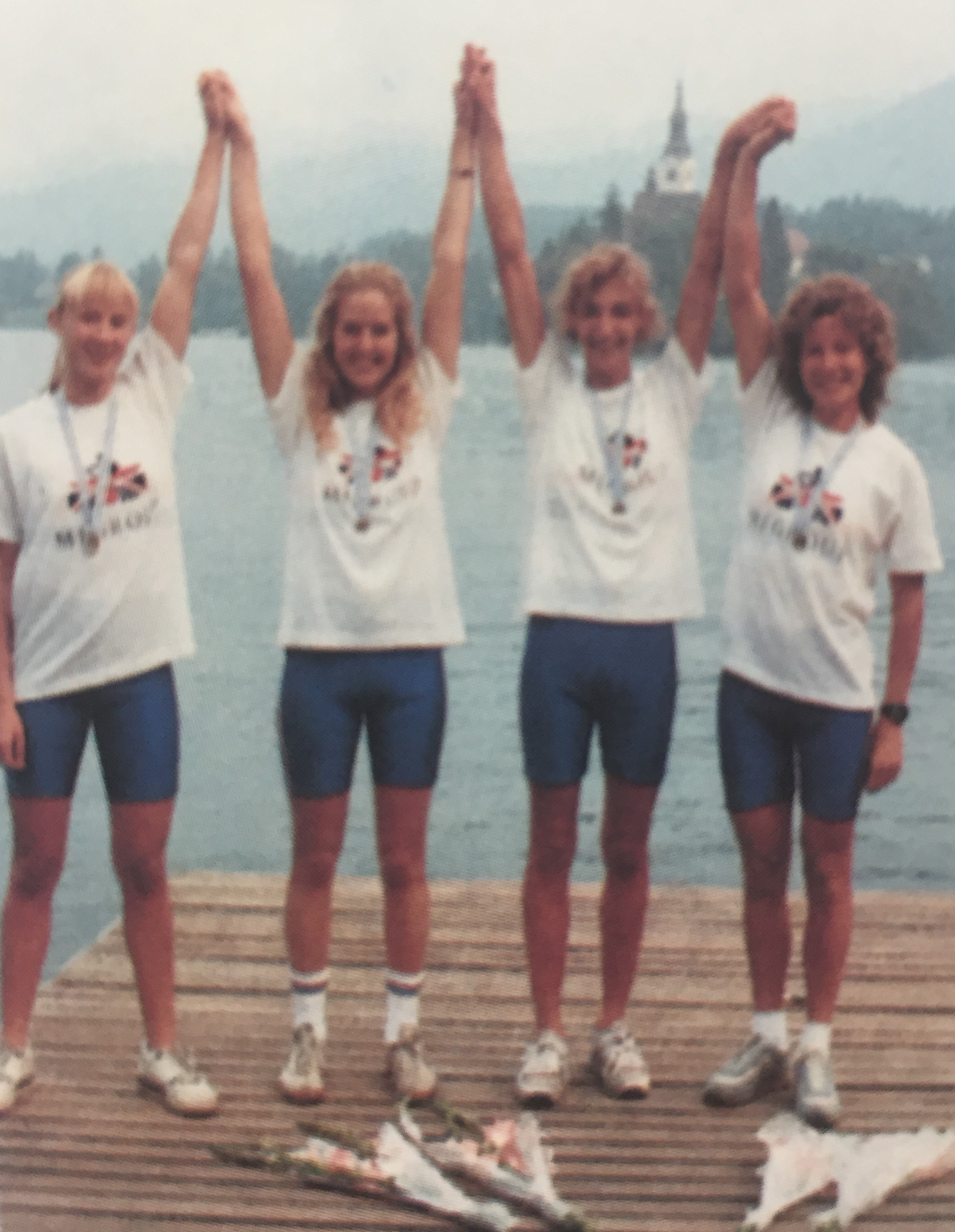Four women with silver medals