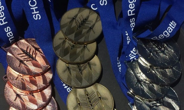 medals with rowing boat design