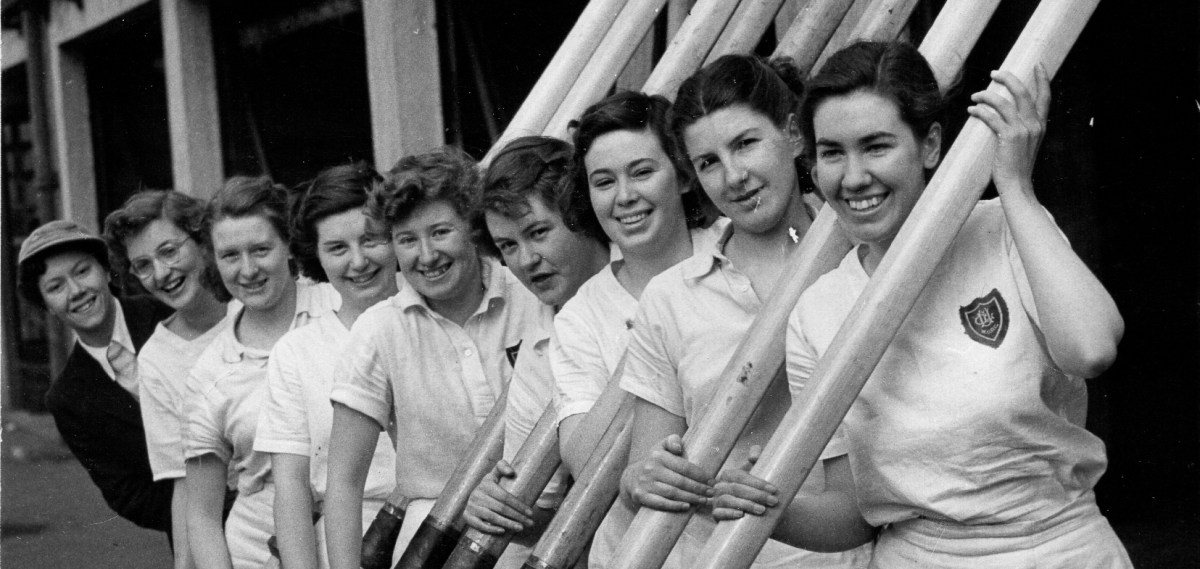 9 women in white shirts outside UL boathouse with oars @copy' Dailypress