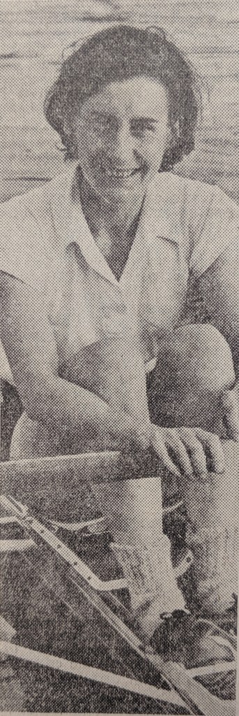 b/w pic of woman in scull