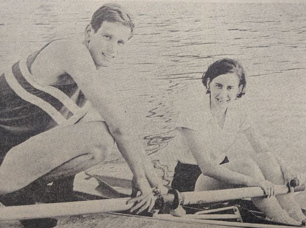 man and woman sculler