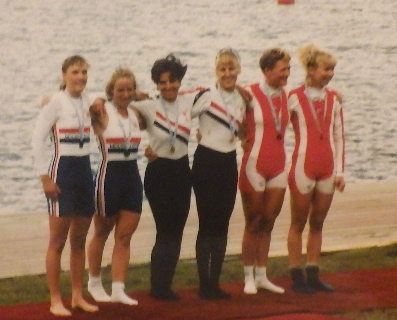 6 women on medal pontoon