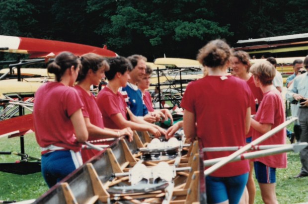 Women in red t-shirts standing round eight