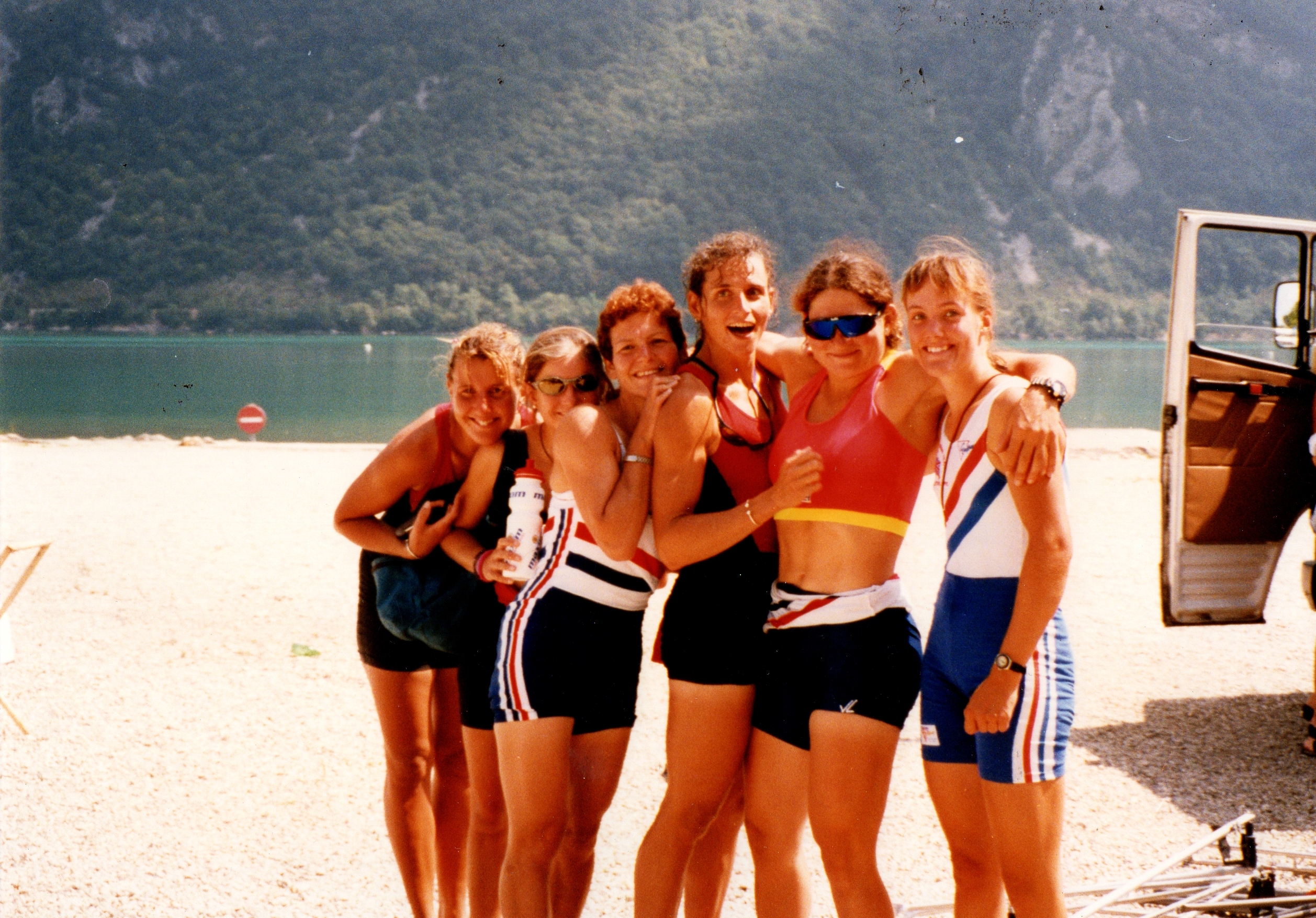 Women standig by lake in sun
