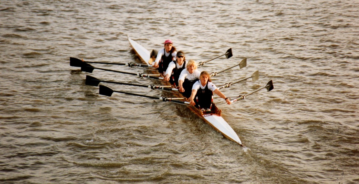 women's quad in wooden boat