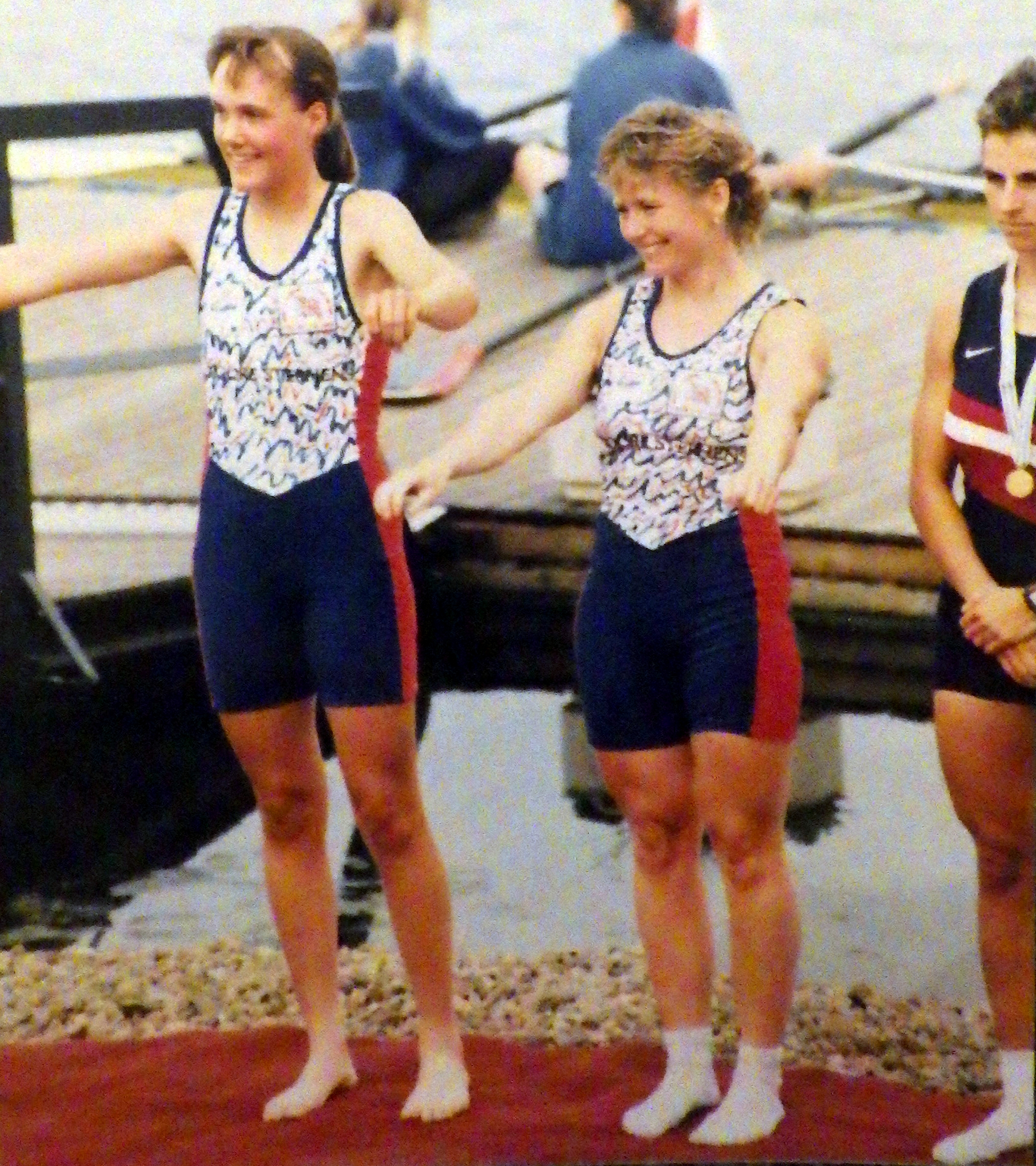 Two women with arms out