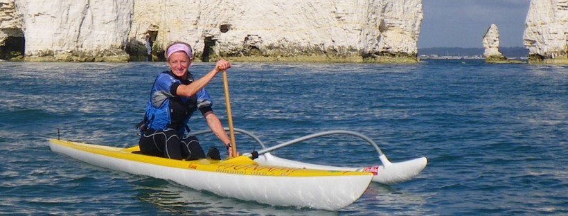 Trisha in an OC1 off Old Harry Rocks, Dorset