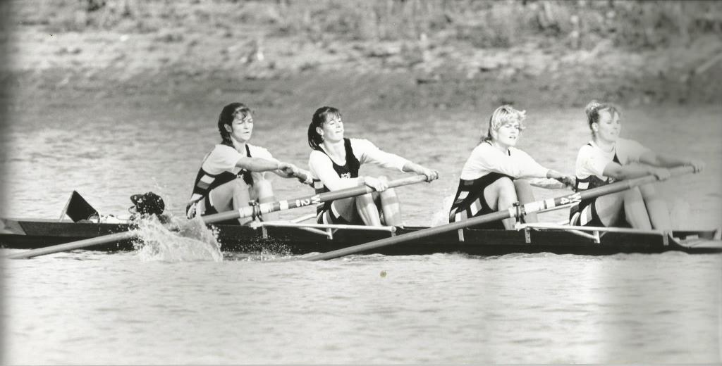 b/w photo of women's coxed four