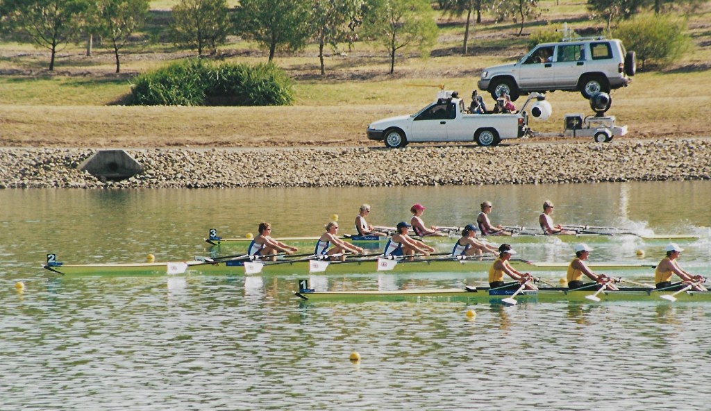 3 women's quad sculls racing, GBR leading, just