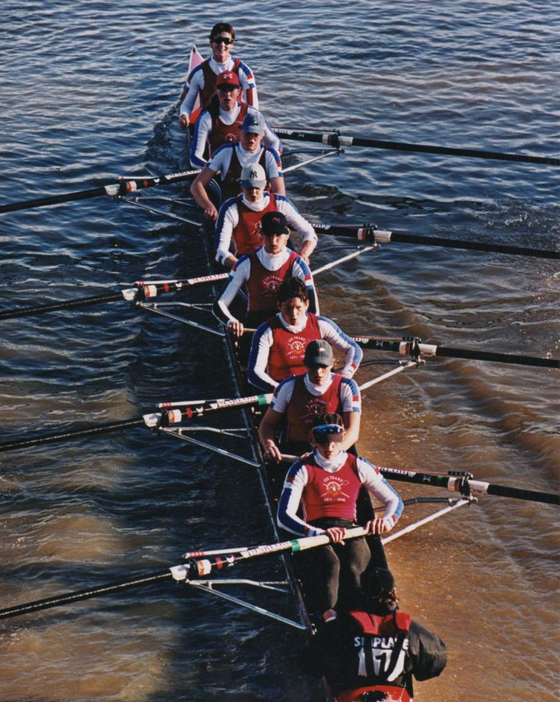 Women's eight in dark red kit