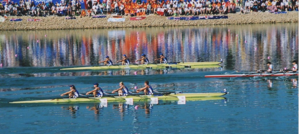 Three women's quads women's approach the line in the 2000 Olympic final