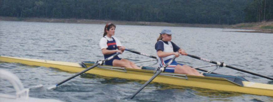 2 women in yellow double scull