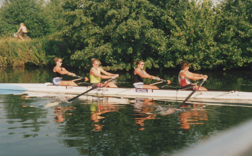 Women's coxless four in blue and white Aylings boat