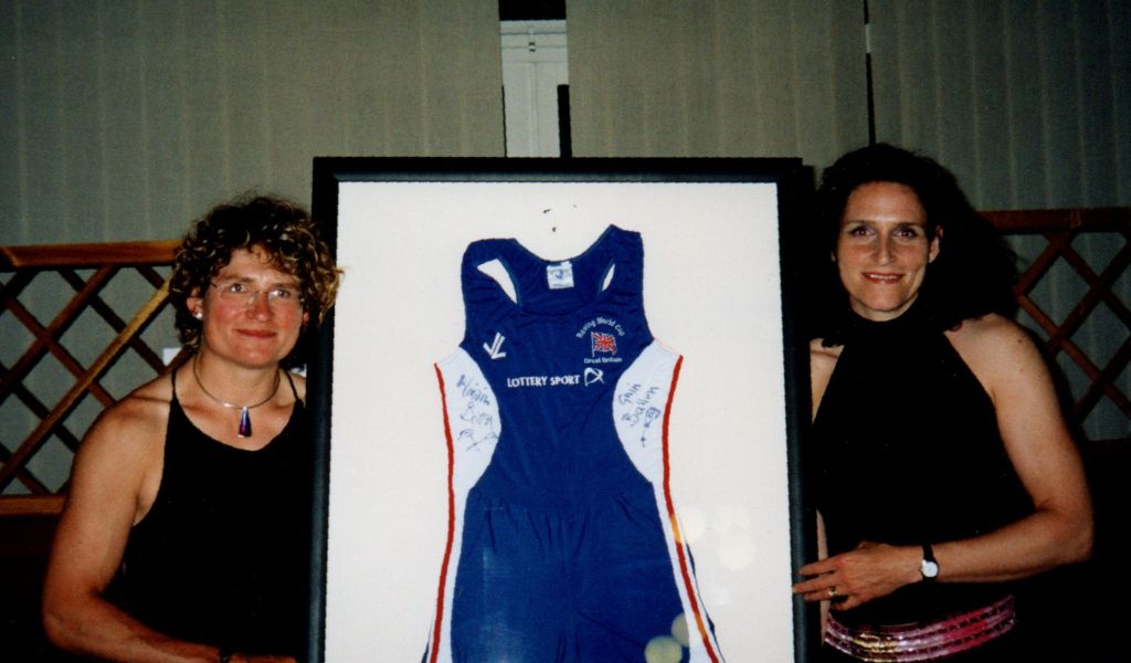 2 women with rowing suit