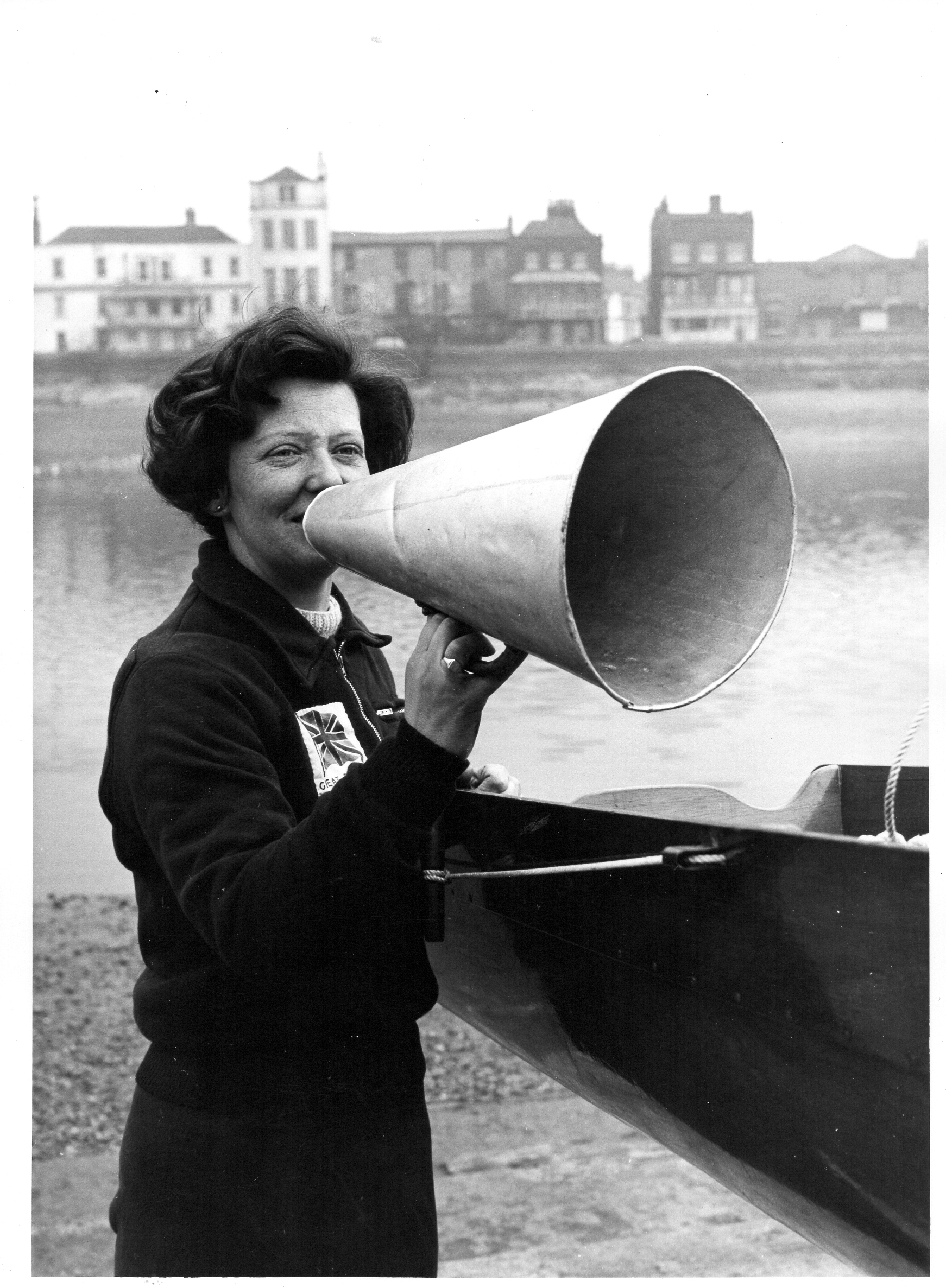 Woman cox with cone megaphone