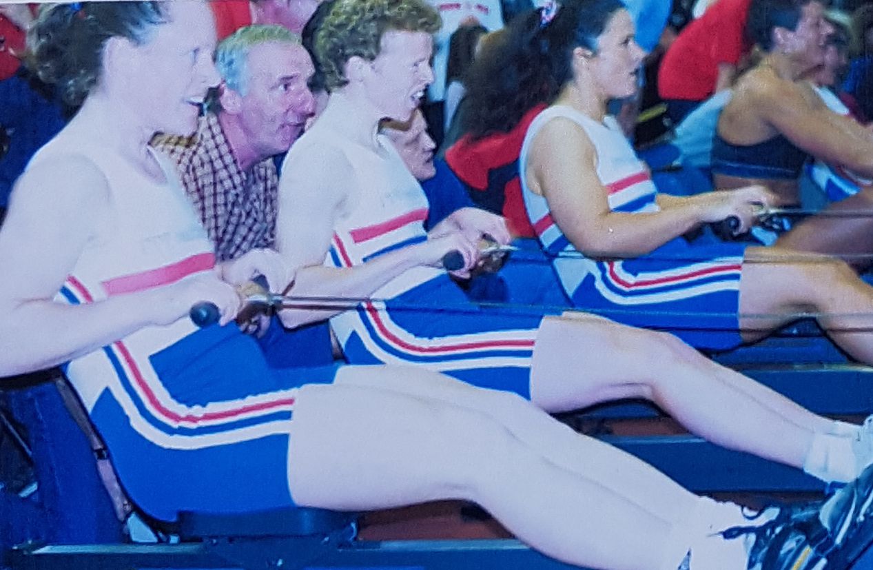 women in GB kit on rowing machines