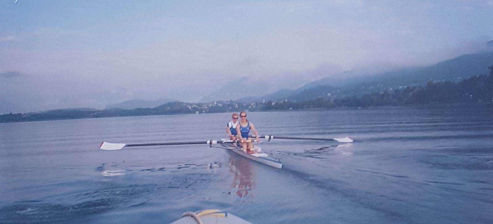 women's pair rowing in flat calm