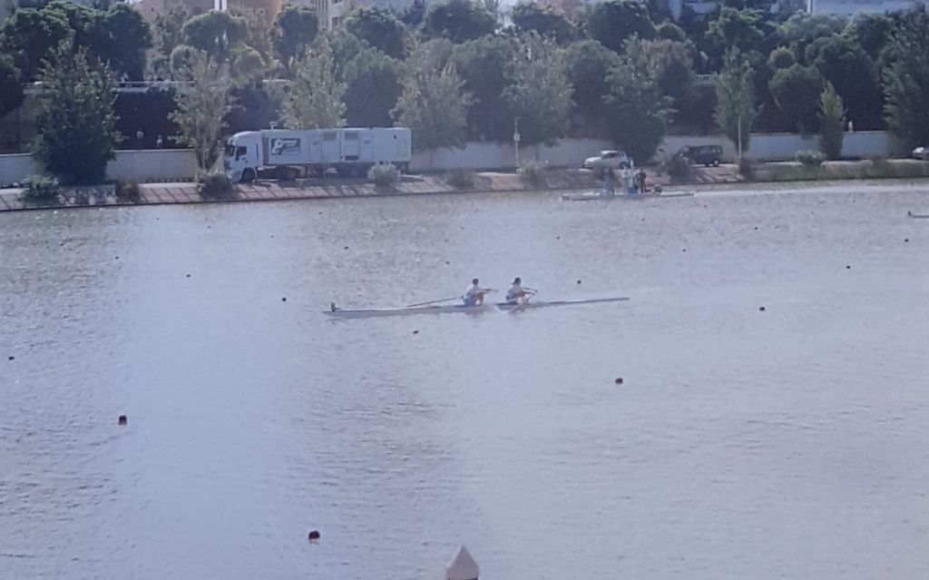 women's pair racing on multi-lane course