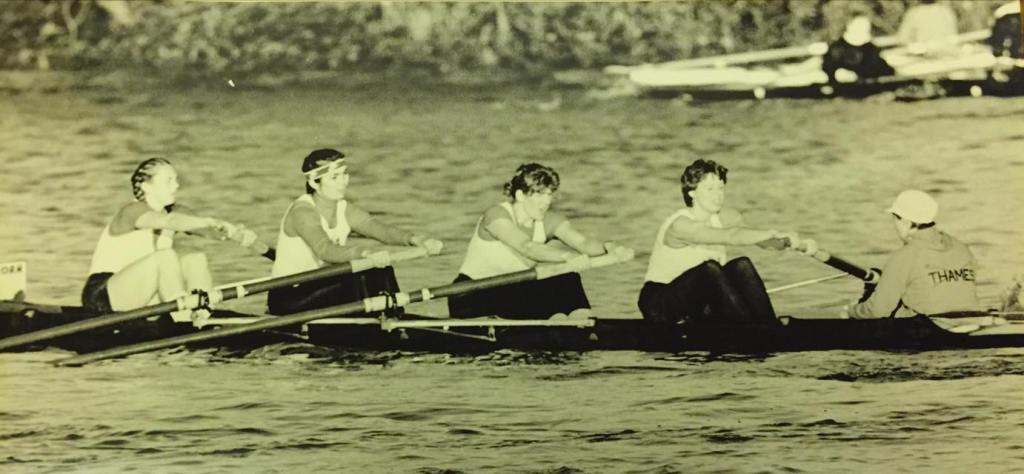 b/w photo of women's coxed four
