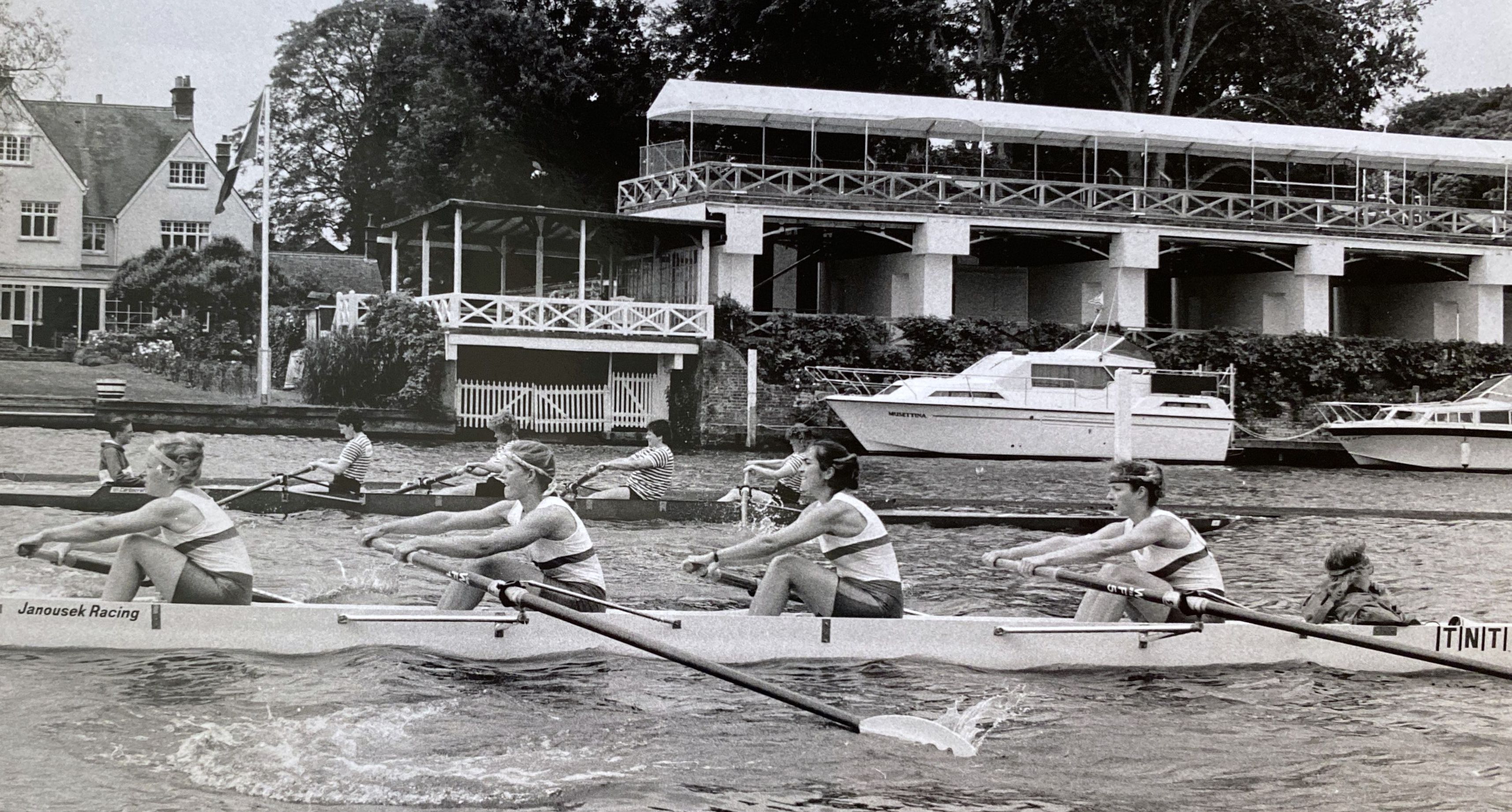 b/w photo of women's fours racing at Henley