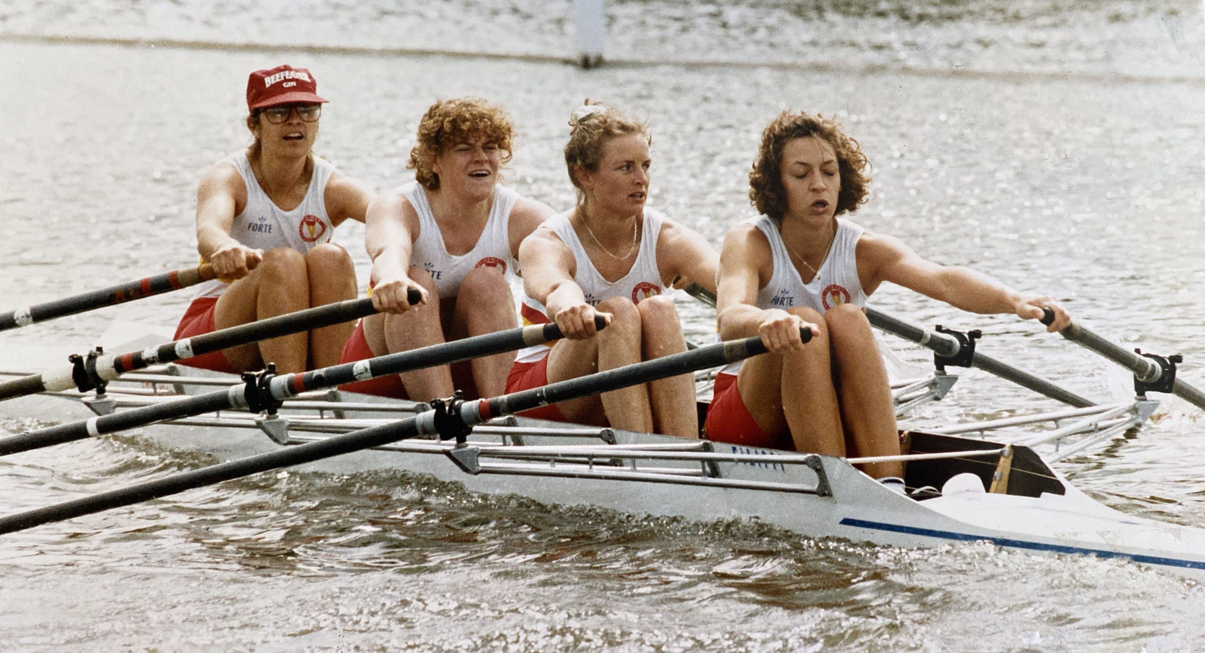 women's quad racing in red shorts